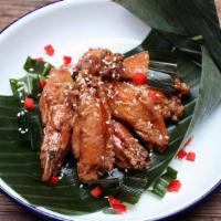Peek Gai Tod - Chicken Wings · chicken wings, plum sauce, toasted sesame seeds