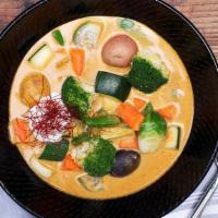 Maa'S Gaeng Pak · homestyle veggies, yellow curry, chili threads, coconut cream