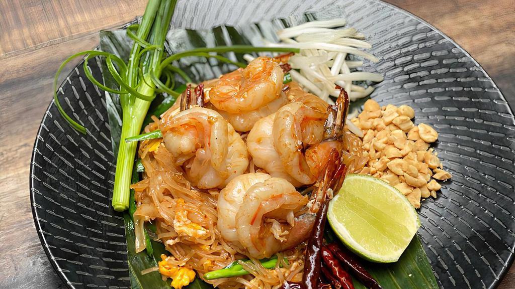 Shrimp Pad Thai · Fresh Thin Rice Noodle w/ 4 Pcs. Jumbo Shrimps, Tamarind, Peanut, Egg, Chive.