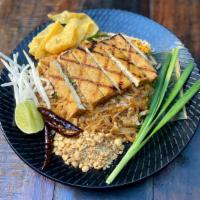 Tofu Yang Pad Thai · grilled tofu, thin rice noodle, tamarind, crushed peanuts, beansprouts, egg
