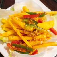 Thai Mango Salad · Spicy. Shredded mango and bell pepper topped with ground peanut. Served with thai sweet and ...
