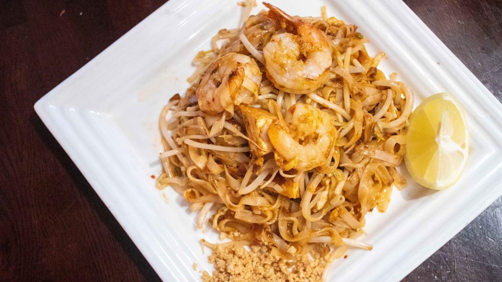 Pad Thai · Spicy. Our version of pad thai, the satisfying thin-flat noodle dish from Thailand, cooked with bean sprouts, tofu and topped with peanut. Spicy.