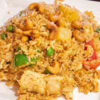 Thai Pineapple Fried Rice · Spicy. Fried rice with shrimp, cashew nuts, fresh pepper, egg and basil paste. Spicy.