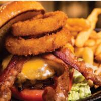 Bbq Bacon Burger   · 6oz. fresh burger served with hickory smoked bacon, lettuce, tomato, and pickle topped with ...