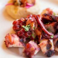 Grilled Octopus · Gluten free. Served with fava, garnish.