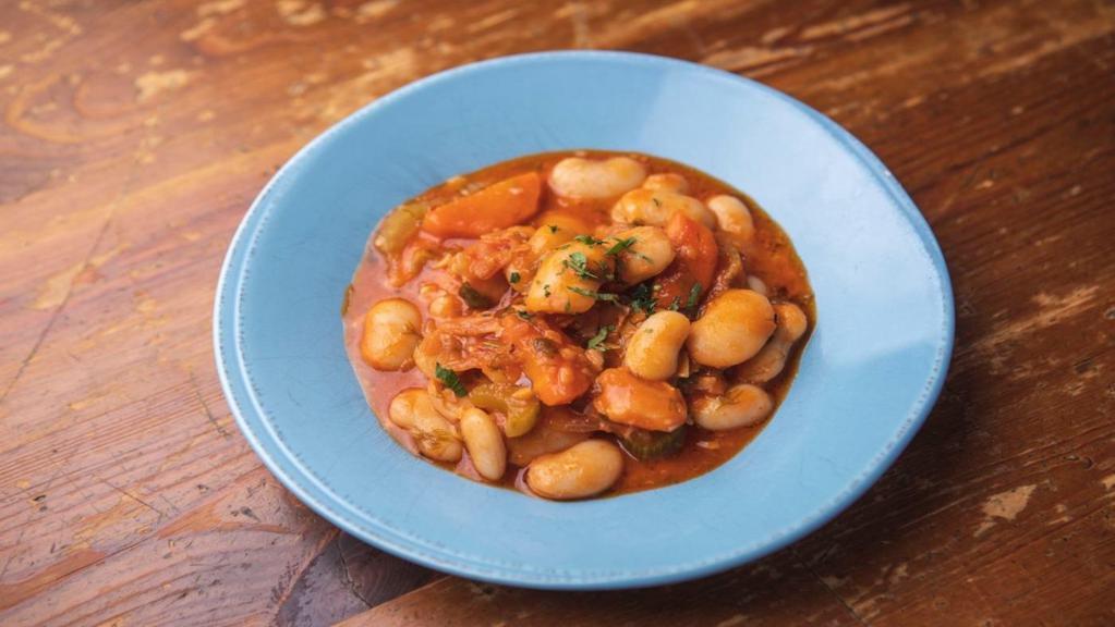 Gigantes · Gluten free. Braised giant beans, tomatoes, vegetables, herbs, and extra virgin oil.