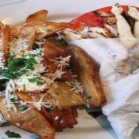 Gyro Chicken Sandwich · Chicken gyro wrapped in pita with tomatoes, onions, and tzatziki.
