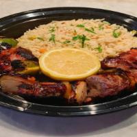Chicken Kebab Platter · Marinated boneless chicken breast cubes with lemon potatoes or rice pilaf.