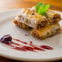 Baklava · Layered phyllo with walnuts, spices, and lemon-infused honey syrup.