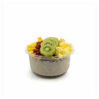 Tide Bowl · Banana blend topped with granola, pineapple, mango, kiwi, goji berries, bee pollen and honey.