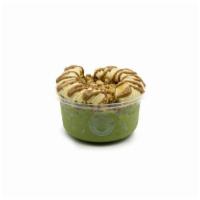 Green Power Bowl · Kale blend with vanilla protein topped with granola, banana, and almond butter. Green bowl b...