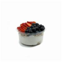Coco Berry · Coconut blend topped with granola, blueberry, strawberry, honey.