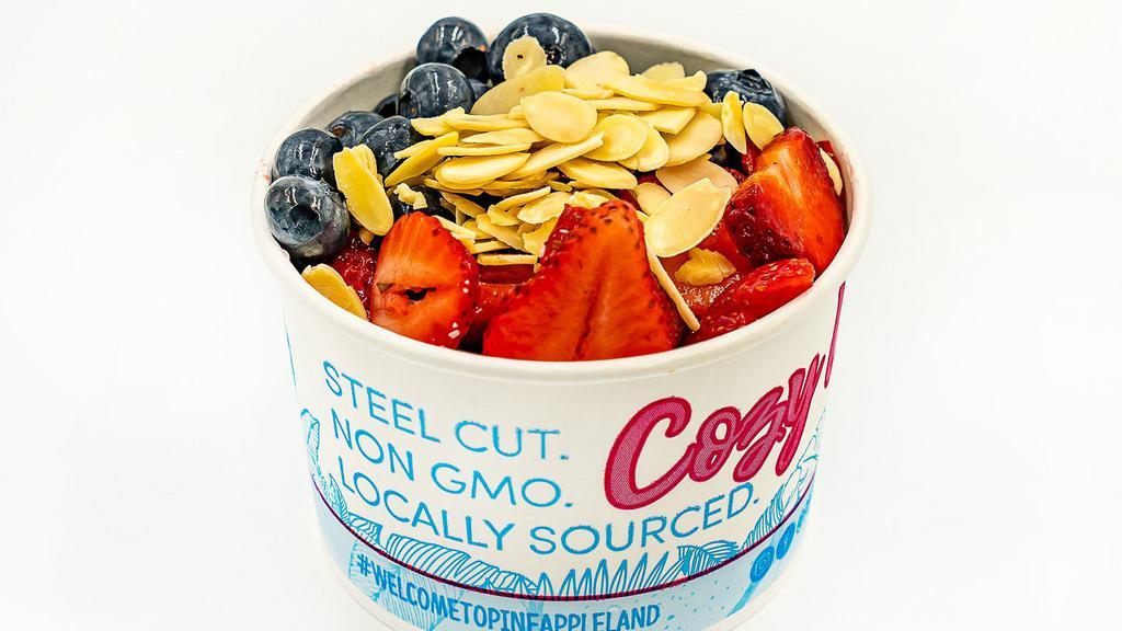 Oatmeal Bowl Number 2 · Oatmeal topped with blueberry, strawberry, and sliced almonds.