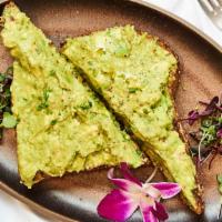Avocado Toast · Seven grains toast with avocado cream spread and chives.