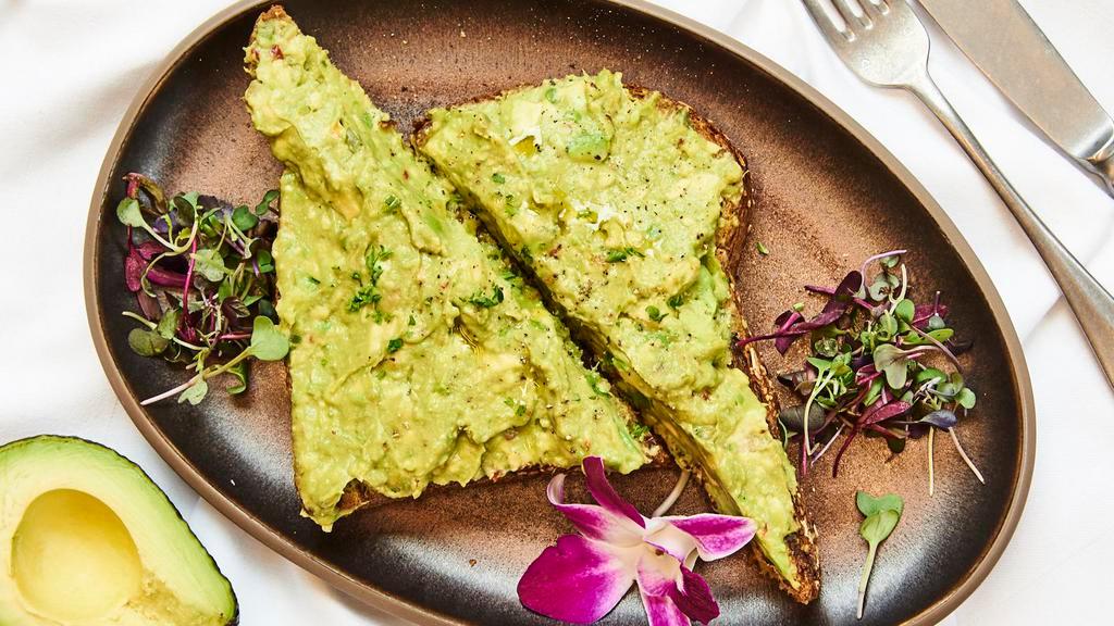 Avocado Toast · Seven grains toast with avocado cream spread and chives.