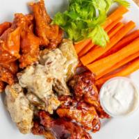 Wings (8 Pieces) · Katch Astoria favorite: served with carrots, celery, blue cheese, and ranch dressing.
