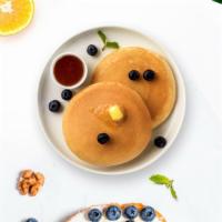 So Blueberry Pancakes · Fluffy pancakes cooked with care and love served with blueberries, butter and maple syrup. S...