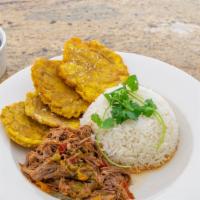 Ropa Vieja · Shredded flank steak slow cooked in a savory tomato sauce.
