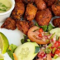 Boneless Chicken Chunks · your choice, rice (yellow or White) and beans, tostones or sweet plantain.