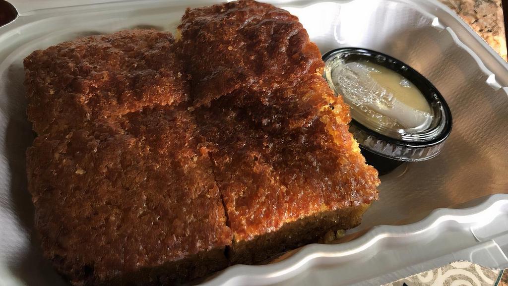 Jalapeño Cornbread · Chopped jalapeño adds the perfect amount of kick to this delicious cornbread. Paired with the subtle sweetness of honey butter.