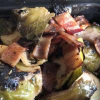 Brussels Sprouts With Bacon · Tossed in olive oil and house blend spices roasted and topped with crispy smoked bacon.