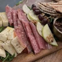 Charcuterie And Cheese · Prosciutto, salami, graviera, brie, toasted bread, fig sauce, pistachio and Kalamata olives.