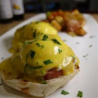 Eggs Benedict · English muffin, poached eggs, hollandaise, Canadian bacon.
