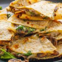 Quesadilla · Loaded with a three cheese blend, olives, onions, jalapenos and tomatoes. Served with sour c...