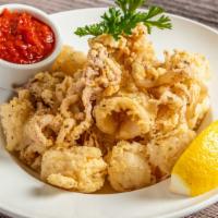 Calamari · Rings of Fresh Local Squid, Lightly Fried or Grilled and Marinara Sauce.
