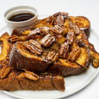 Banana Pecan French Toast · Served with maple syrup and butter.