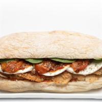 Chicken Milanese · Breaded Chicken | Roasted Tomatoes | Fresh Mozzarella | Arugula | Pickled Peppers | Almond P...