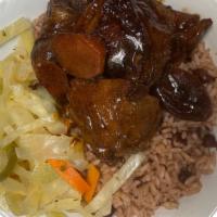 Brown Stew Chicken W/ Rice & Beans Lunch Special 4 · Brown stew chicken rice and beans, steam vegetables