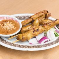 Chicken On Skewers (4 Pieces) · Marinated chicken with lemongrass and cumin, seasonings, charcoal grilled, peanut dipping sa...