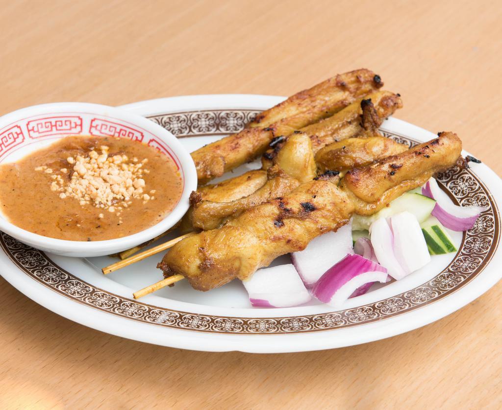 Chicken On Skewers (4 Pieces) · Marinated chicken with lemongrass and cumin, seasonings, charcoal grilled, peanut dipping sauce.