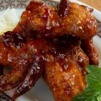 Fried Chicken Wings (3 Pieces) · Hot and spicy. Glazed chicken wings, shaoxing cooking wine, turmeric.