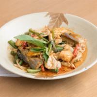 Red Curry · Hot and spicy. Fresh pounded red chili paste, lemongrass, bamboo strips, Thai eggplant, bell...