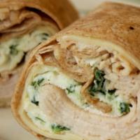 Healthy Wrap #1 · Eggwhite Omelet with Roast Turkey, Spinach and Swiss cheese served on whole wheat wrap.