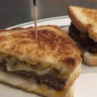 Patty Melt · 8oz Angus Beef Burger on a Grilled Cheese with chopped onions & more Cheese