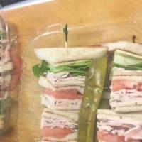Roast Turkey And Swiss Club Sandwich · Lettuce and tomato. Triple decker sandwiches are served with French fries