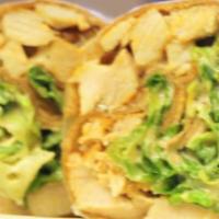 Crispy Chicken Caesar Wrap · Crispy chicken tenders, romaine lettuce, parmesan cheese, and Caesar dressing. Wraps are who...