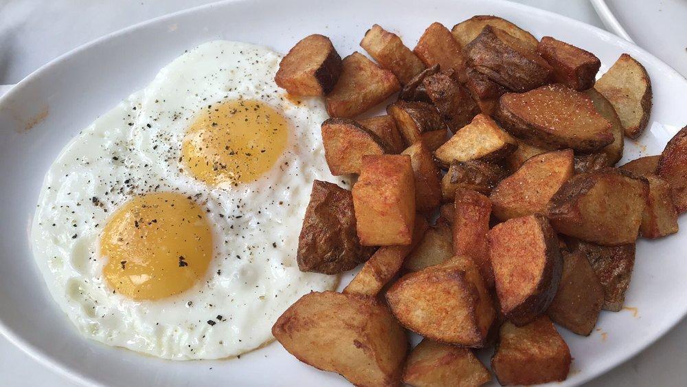 2 Eggs Any Style · Served with roasted breakfast potatoes and toast.