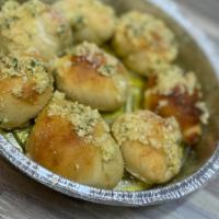 Garlic Knots (8) · With red sauce.