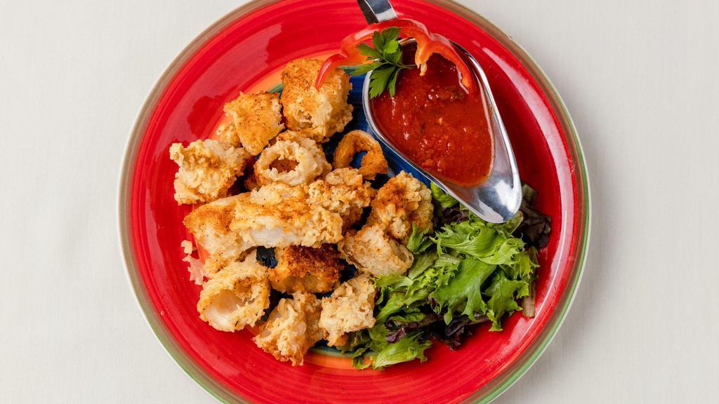 Calamari · Lightly battered and fried to tender crisp, served with a Marinara dipping sauce.