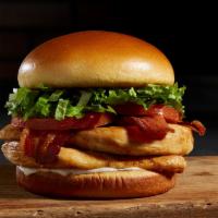 Chicken Club · Hand-breaded chicken breast with swiss, applewood smoked bacon, honey mustard, lettuce, toma...