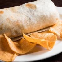 Special Burrito · Meat or specialty veggie, rice, beans, guacamole, and cheese.
