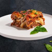 Lasagna · Layers of pasta, sauce, and cheese topped with fresh Pecorino Romano and baked to perfection.