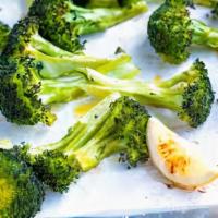Roasted Broccoli · Roasted and tossed with olive oil and garlic.