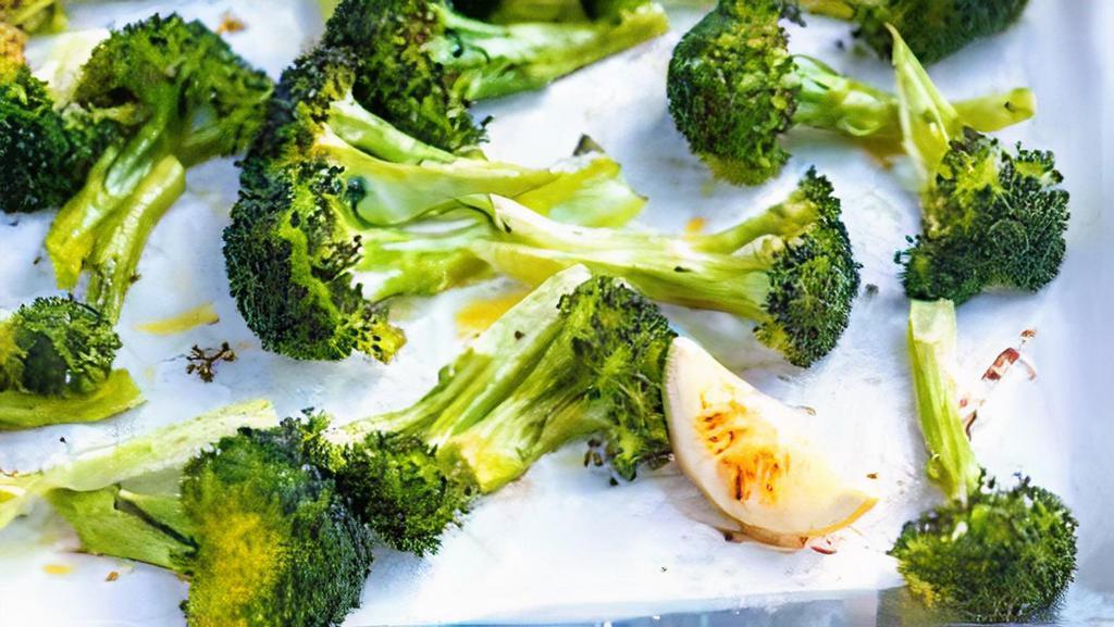 Roasted Broccoli · Roasted and tossed with olive oil and garlic.