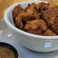 Popcorn Chicken · Boneless battered chicken, honey mustard and chipotle ranch dipping sauce