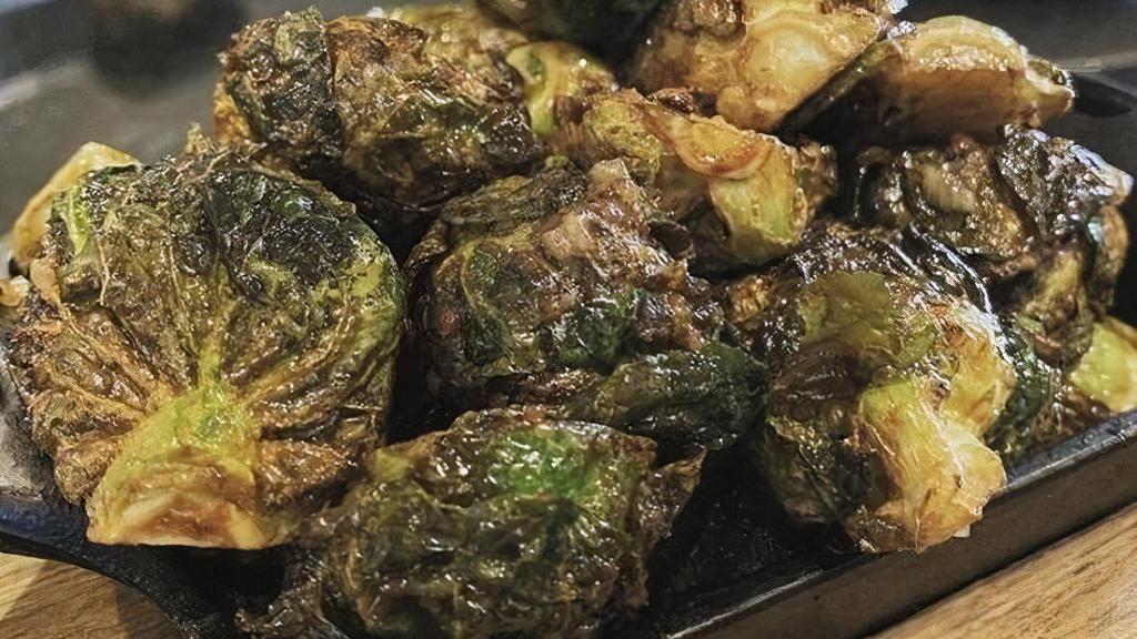 Crispy Brussels Sprouts · Whole grain honey mustard glaze, . roasted shallots